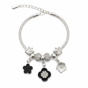 Elegant Silver and Black Clover Charm Bracelet